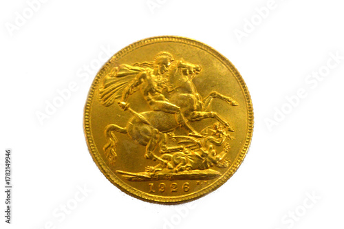 The reverse side of King George V gold sovereign coin, features the classic St. George and the Dragon, sovereigns are popular among UK investors, gold asset investment, market price of gold concept