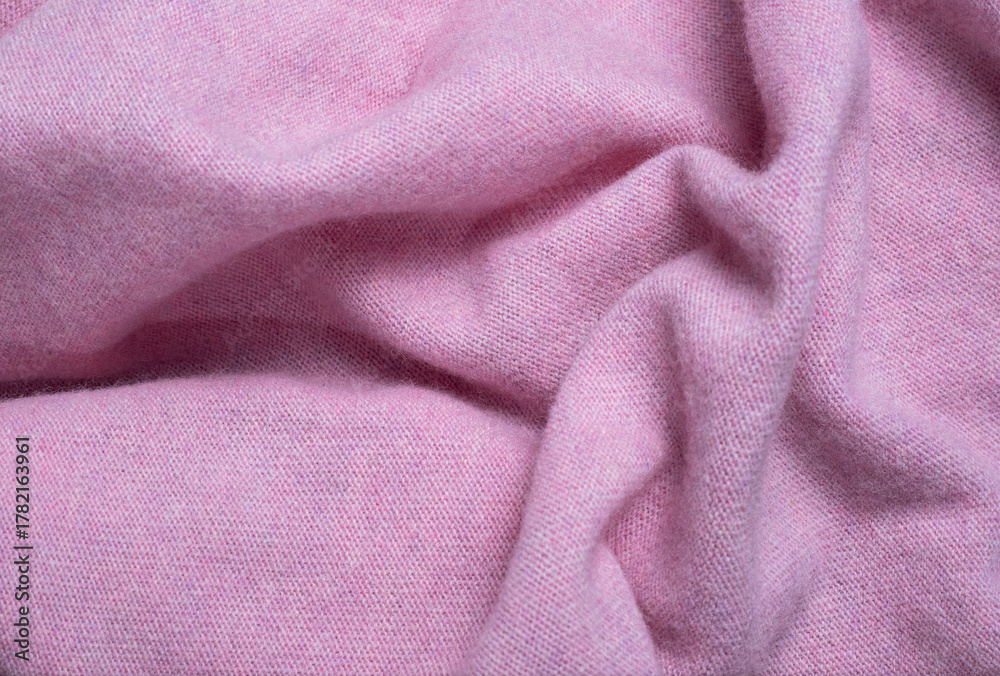 Fototapeta premium soft pink wool fabric with natural folds and cozy texture