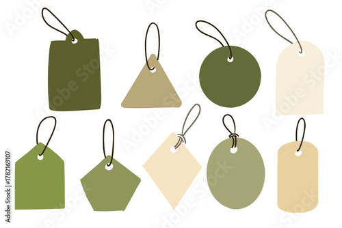 Set of blank eco paper tags in natural green and beige tones with various shapes and strings. Concept of sustainability, handmade packaging and eco friendly product labeling