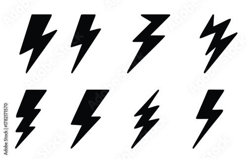 set of black silhouettes of lightning