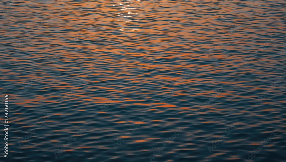 Fototapeta premium Morning glow shimmering on peaceful water with a blend of warm and cool tones, abstract natural texture with waves and summer vibes