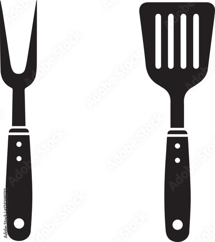 Black silhouette of a barbecue fork and a slotted spatula with textured handles isolated on a white background representing grilling tools