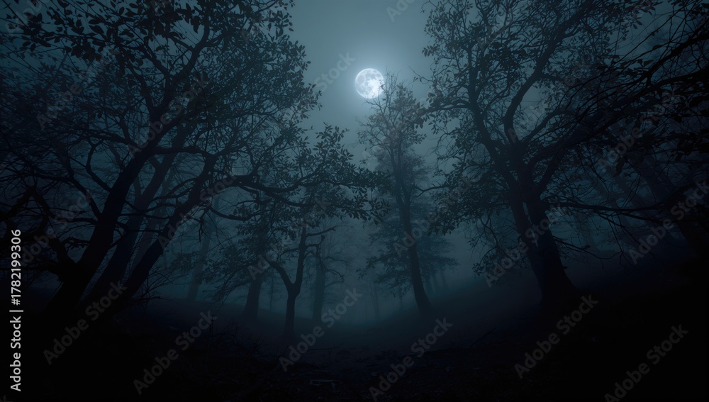 Fototapeta premium The dense forest shrouded in darkness and haze, enhancing the eerie atmosphere for Halloween