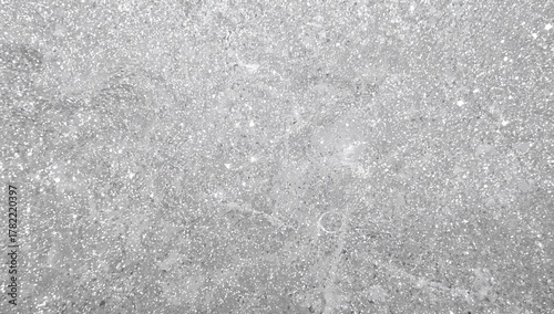Shimmering silver sparkle texture with an abstract design