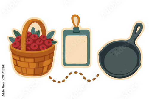 Rustic kitchen essentials set featuring a basket of red berries, blank cutting board, and cast iron skillet