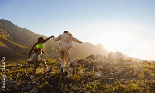 Couple hiking on a mountain path