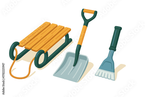 Set of winter equipment including wooden sled, snow shovel, and ice scraper brush