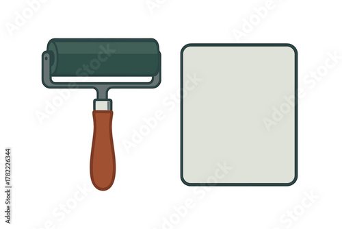 Brayer roller tool with wooden handle next to a smooth rectangular inking plate for printmaking
