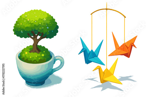 Miniature green tree growing in a ceramic teacup next to colorful hanging origami paper cranes