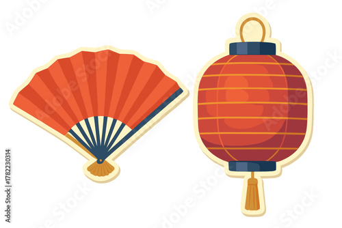 Traditional red folding hand fan and decorative Chinese lantern set for cultural celebrations