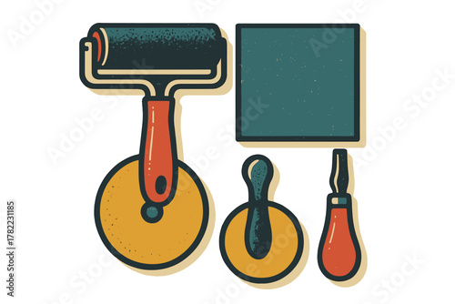 Vintage printmaking tools set with brayer roller and carving instruments