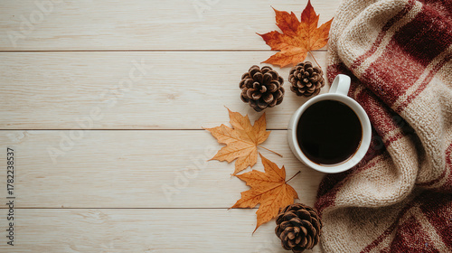 Composizione autunnale con tazza di caffè, pigne e foglie secche su tavolo di legno. Generative AI