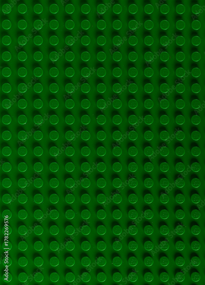 Naklejka premium Vibrant Green LEGO Baseplate Top View Seamless Pattern