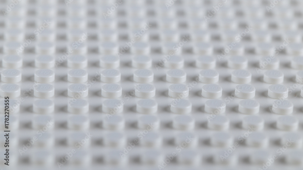 Naklejka premium White LEGO Baseplate Top View Seamless Pattern