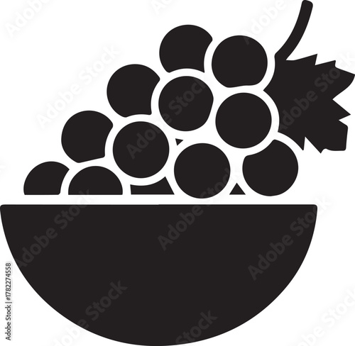 Simple silhouette of ripe grapes in a bowl with a single leaf