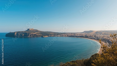 Fototapeta Naklejka Na Ścianę i Meble -  Scenic view of a coastal landscape with azure waters and clear skies, emphasizing summer travel experiences