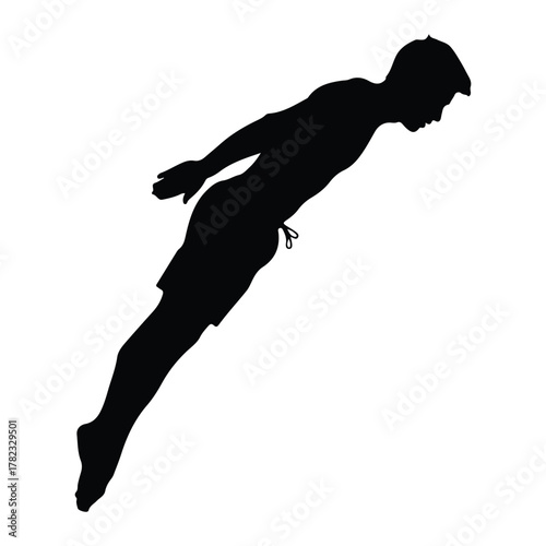 Silhouette of a diver in mid-air descent diving sport