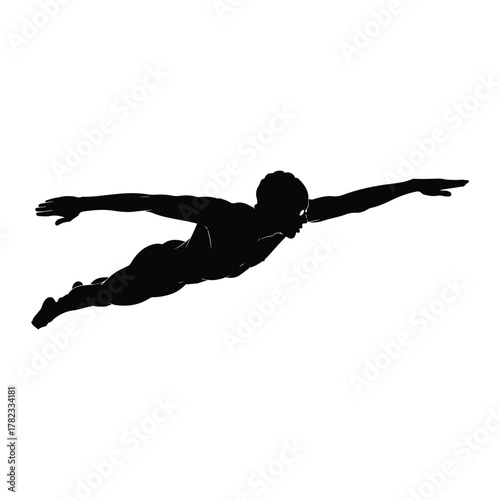 Silhouette of a male swimmer performing butterfly stroke Keywords: silhouette, male, swimmer