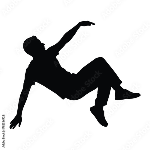Silhouette of a man in a dynamic falling pose action