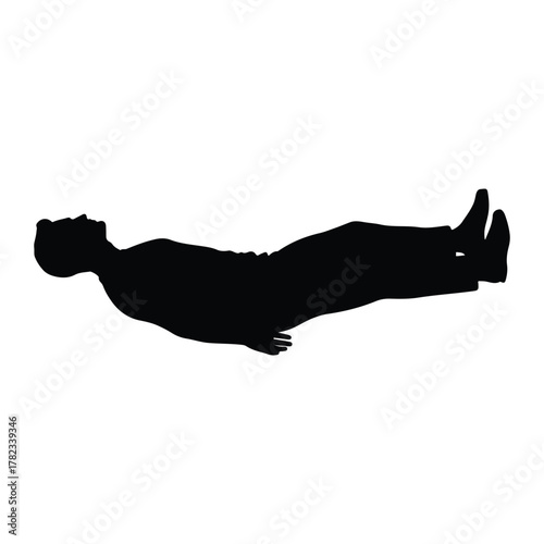 Silhouette of a man lying on his back with legs extended
