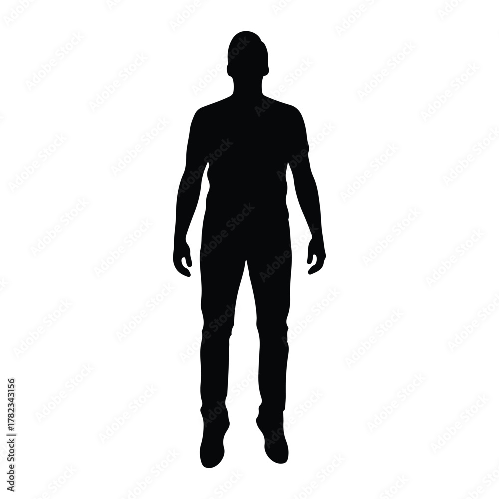 Fototapeta premium Silhouette of a man standing with arms at his sides