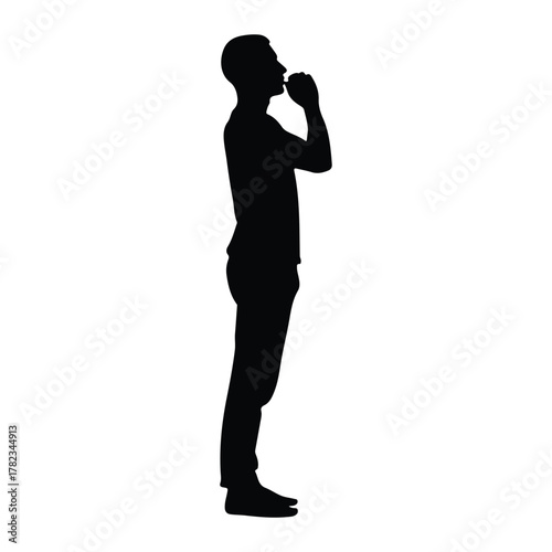 Silhouette of a man thinking or praying contemplation