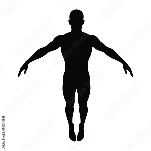Silhouette of a man with arms outstretched in mid-air