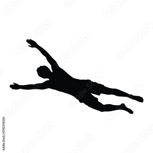 Silhouette of a swimmer in freestyle stroke swimming