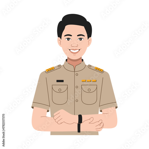 A smiling man in a tan uniform with epaulets stands with his arms crossed.