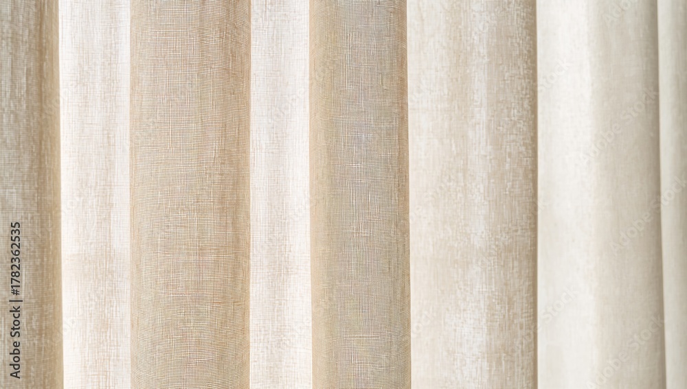 Fototapeta premium Close-up of a sheer light beige curtain with woven texture, ideal for enhancing natural light in a room