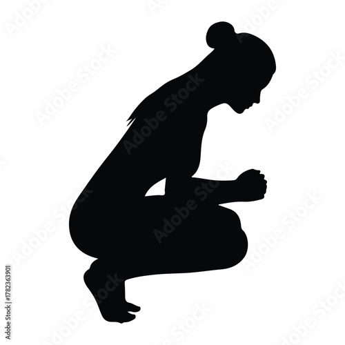 Silhouette of a woman in a squatting prayer pose female