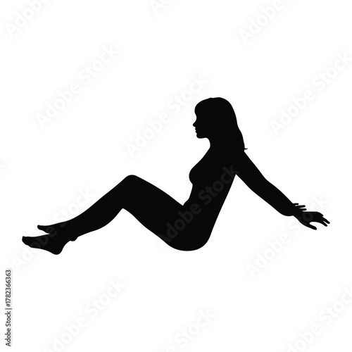 Silhouette of a woman sitting with arms extended female