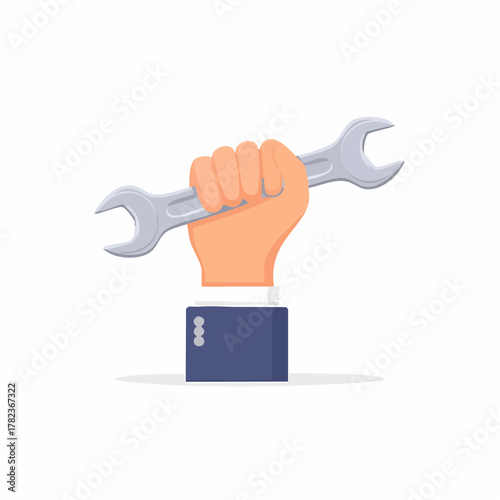 Hand wearing suit holding adjustable wrench tool for repairs and maintenance