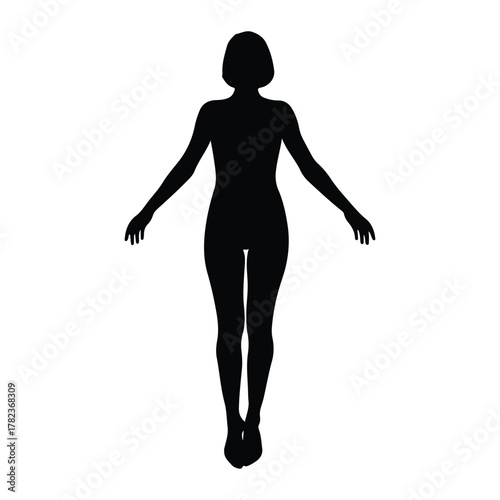 Silhouette of a woman standing with arms outstretched