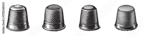 A set of four vintage sewing thimbles in different designs, showcasing intricate details and craftsmanship.