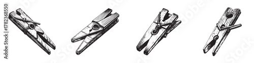 A set of four vintage-style wooden clothespins arranged artistically.