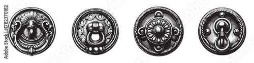 Four intricately designed vintage door knobs in black and white, showcasing elegant craftsmanship.