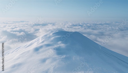 A snow-covered mountaintop ...