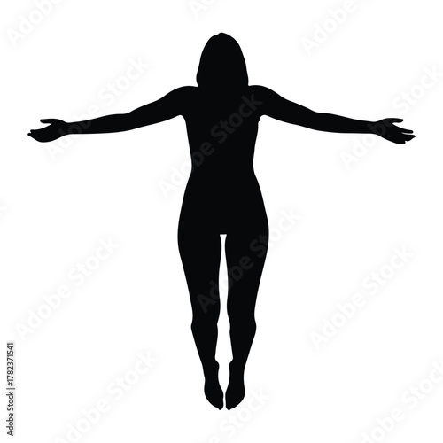 Silhouette of a woman with arms outstretched in a floating pose