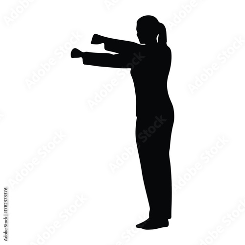 Silhouette of a woman with fists clenched on a white background