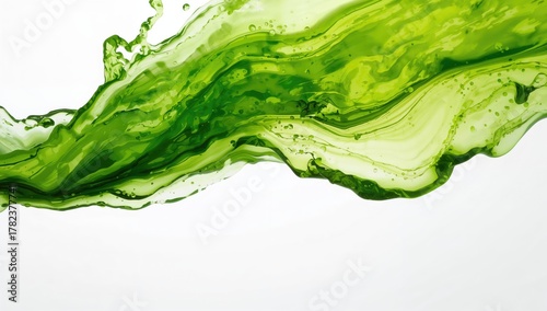 Green liquid splashing agai...