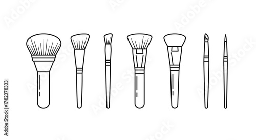 Collection of seven different makeup brushes in outline style, presented linearly on a white background. Includes powder brushes, foundation brushes, and smaller detail brushes, perfect for graphic