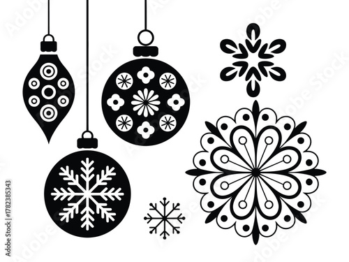 Festive black and white silhouette Christmas ornaments and snowflakes hang against a white background.