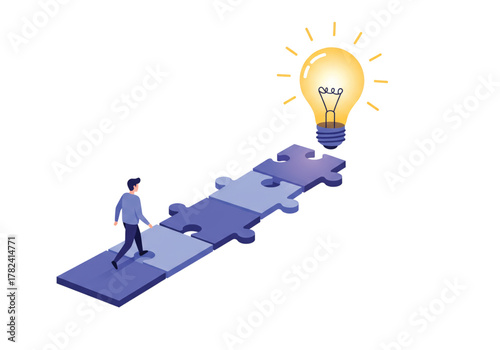 A person walking on a path of puzzle pieces towards a glowing lightbulb, representing an idea.