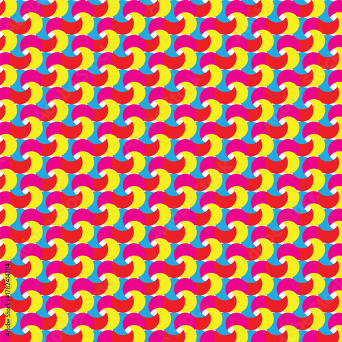 This is a vibrant, repeating geometric pattern with a playful and retro feel. It features interlocking, curved shapes in bright primary and secondary colors: red, yellow, pink, and a vivid blue backgr