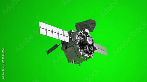 Sleek satellite orbiting against a vibrant green screen, perfect for visual effects or simulating space missions, dynamic and modern tech footage