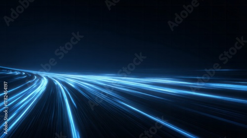 Intense bright blue light trails speed across a dark, abstract background surface