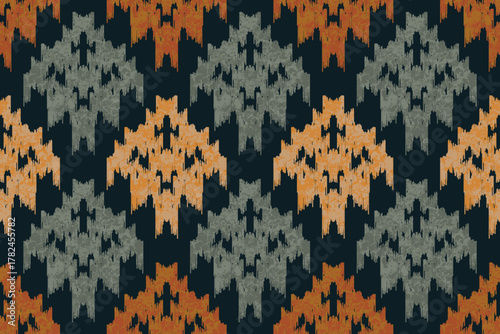 Traditional ethnic Ikat pattern with geometric motifs in warm orange and gray tones on a dark background. Seamless tribal textile design inspired by handcrafted weaving, ideal for fabric, fashion