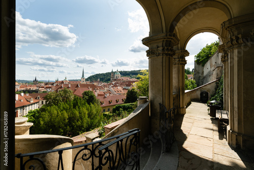 Prague, Czech Republic – August 6, 2025: Panoramic view from the Baroque arches and terraces of the Palace Gardens below Prague Castle, Malá Strana, Prague, Czech Republic, on a sunny summer afternoon
