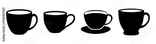 Collection of four black coffee cups and mugs with white interiors, isolated on a